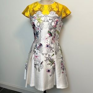 Ted Baker- Silk Dress in Beautiful Print.  Fit & Flare design.  Simply Gorgeous!